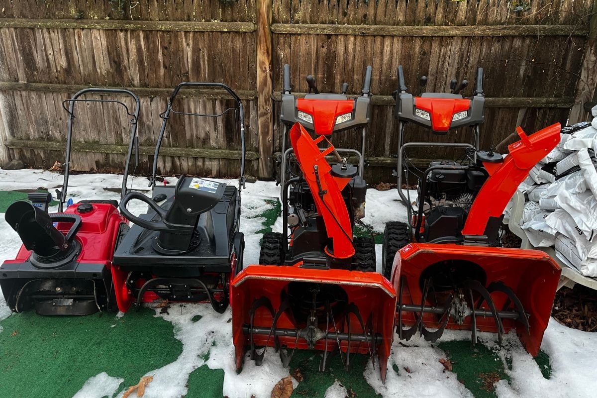 snow-removal-equipment-ready-for-winter Professional snow blowers and heavy-duty winter equipment ready for residential service routes