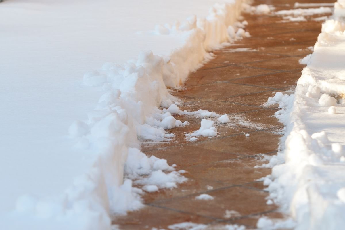 Expertly cleared residential pathway showing clean edges after snow service by Snow Removed